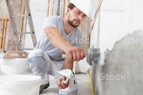 Arbeiter beim Putzauftragen